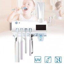 Dozator pentru pasta de dinti cu alimentare solara si sterilizator UV pentru periute